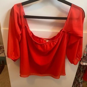 Red off the shoulder blouse. Chiffon sleeves